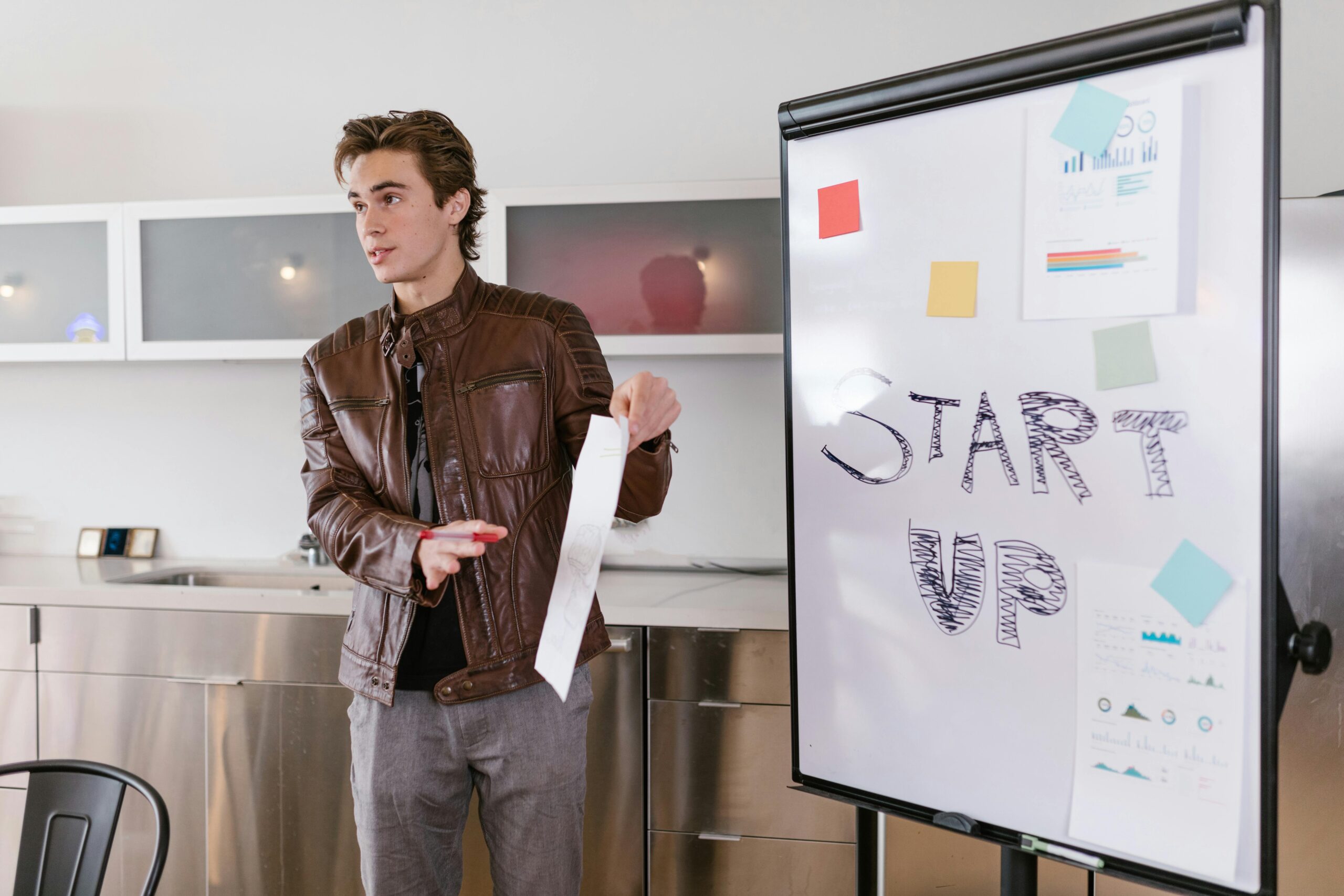 young marketing intern presenting in a meeting